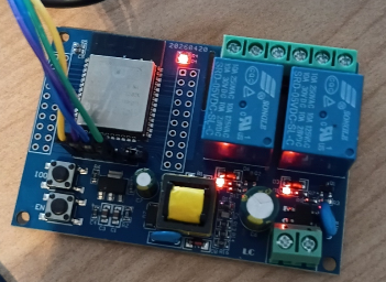 Physical ESP32-WROOM-32E AC dual-relay node with both Relay X2 channels energised
